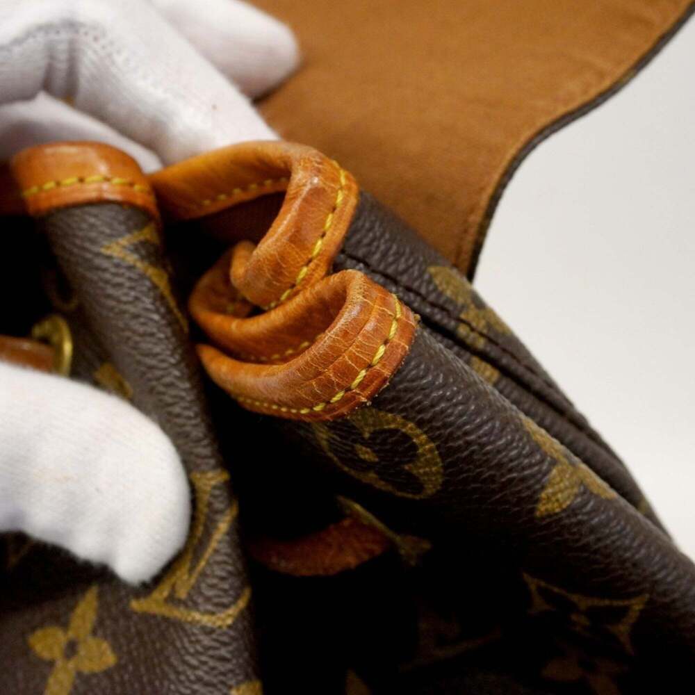 LOUIS VUITTON Brown Monogram Backpack - Picture 11 of 14